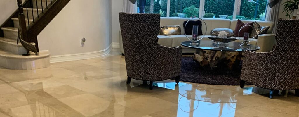 Beige shiny marble floor in a living room setting.